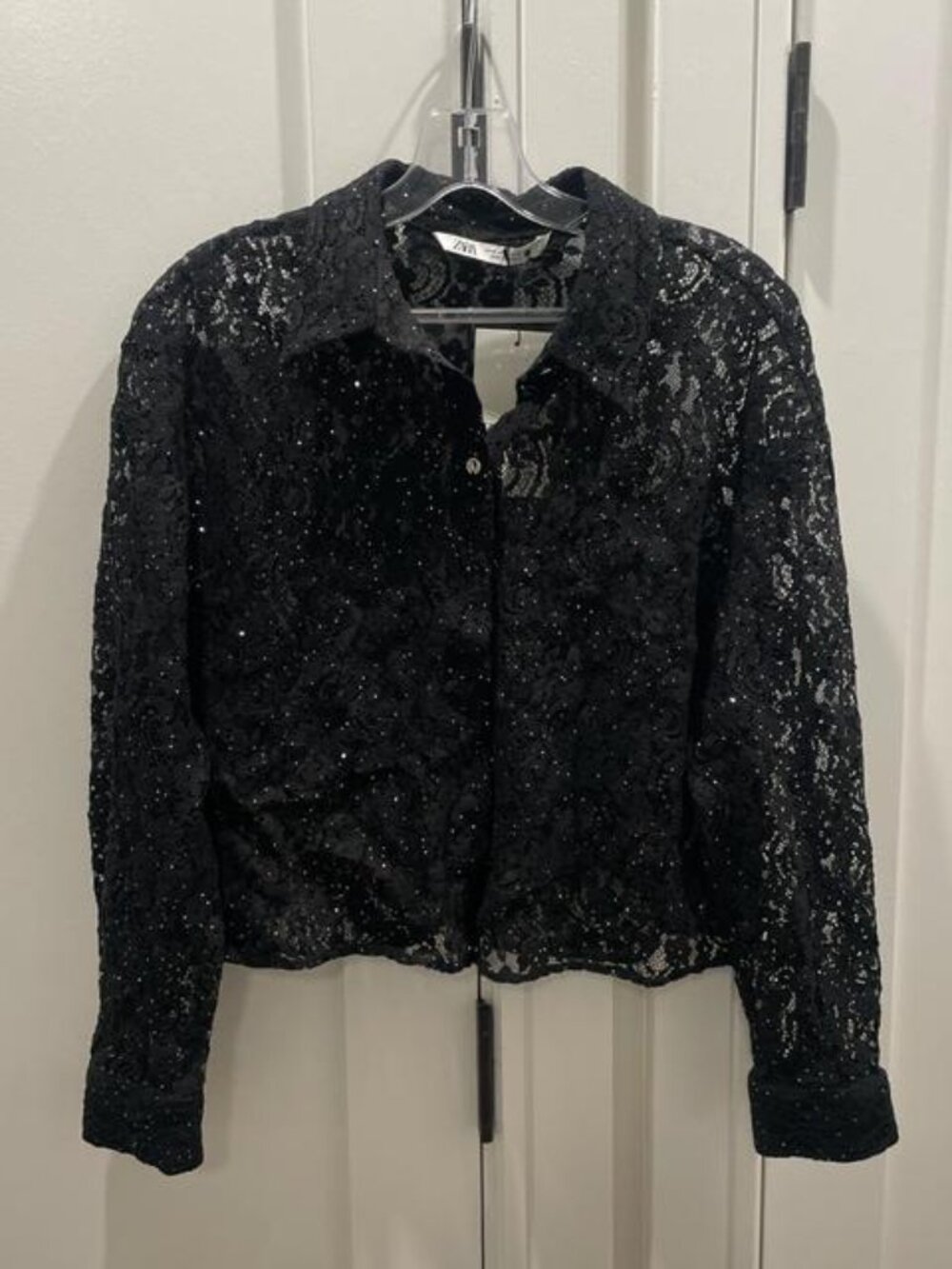 Black lace button-up shirt with sequins, part of a set